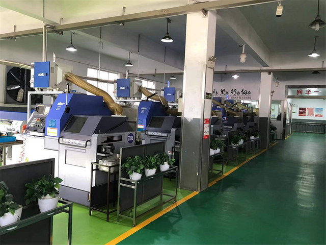 &Aacute;rea de usinagem do torno CNC do tipo su&iacute;&ccedil;o